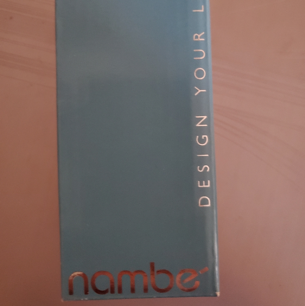 Nambe initial (L) winestopper